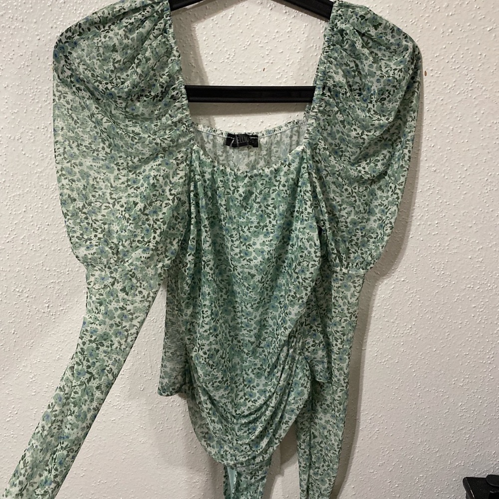 Rebellious 
Color: Green with flowers
Size: S/M 
Size: 6